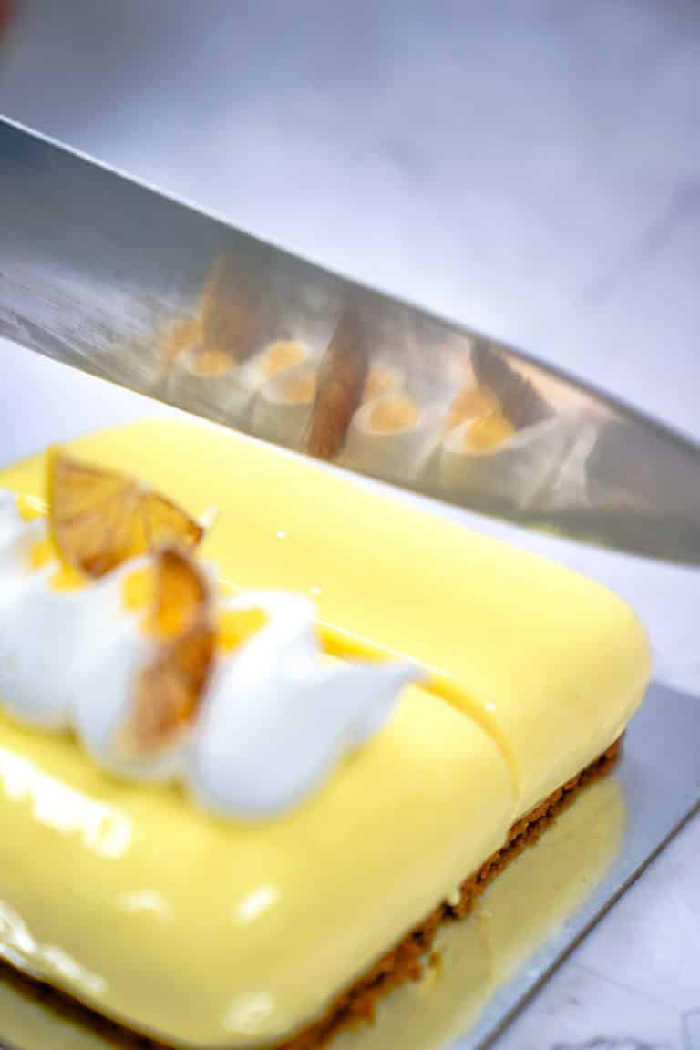 Slicing a Lemon Cake Using Knife — The Standard Market Company In Brisbane, QLD