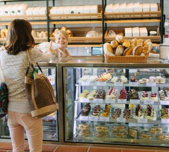Woman Buy At Bakery Shop — The Standard Market Company In Brisbane, QLD